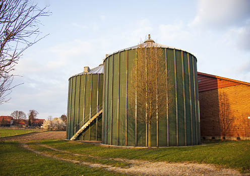 silo tower,Grain storage tank, grain dryer, Spacious metal structure for storing seeds on the farm, flat bottom silos, elevator
