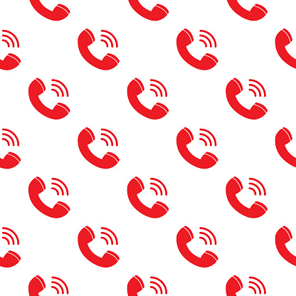 Vector seamless pattern of red telephone receivers on a square white background.