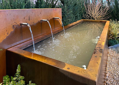 water fountain in beautiful scenic botanical gardens 