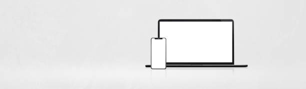 istock Front view of laptop and modern mobile phone on white background - easy modification 2069292456