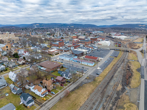 Sayre, PA, USA - 03-03-2024 - Cloudy winter aerial image of the downtown area in the City of Sayre, PA.