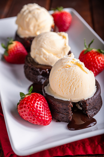 Molten Chocolate Cake with Vanilla Ice Cream and Strawberries