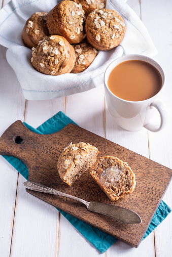 Homemade Banana Muffins with Butter and Coffee