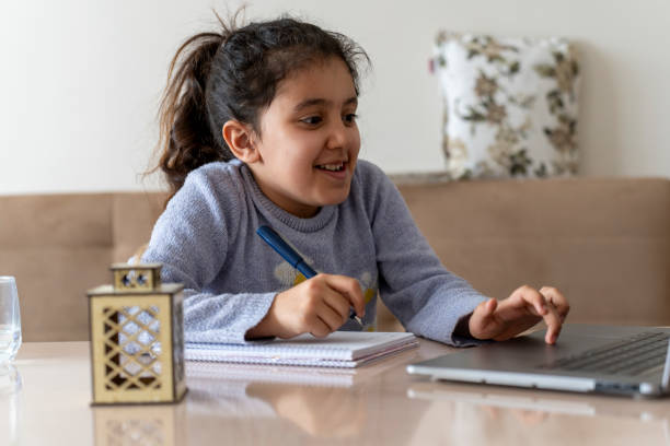 istock A girl studying at home. 2069403273