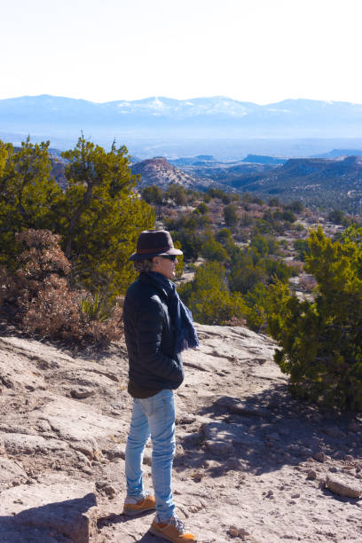 istock Los Alamos, NM: Man Overlooking Otowi Mesa, San Ildefonso Pueblo 2069427835