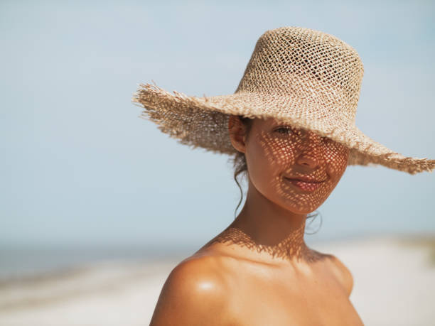 istock Beach Woman in Sun Hat on Vacation 2069435049