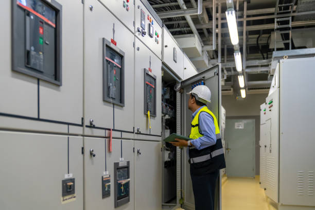 istock Asian man engineer working at factory server electric control panel room. 2069451871