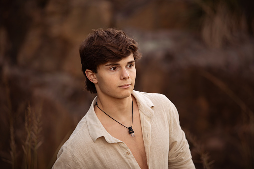 Portrait of an Argentinean teenager boy in the mountains - Buenos Aires - Argentina