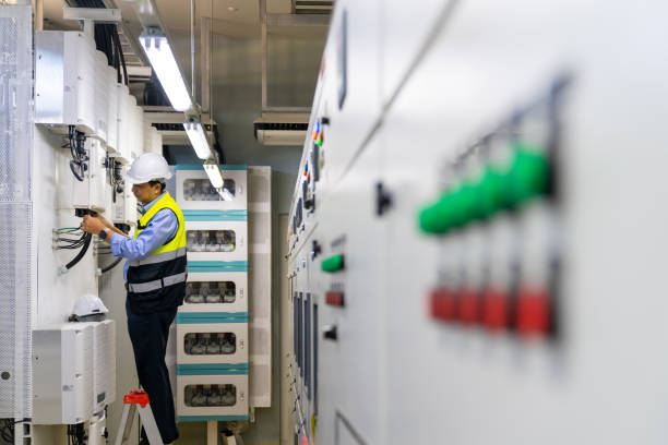 istock Asian man engineer working at factory server electric control panel room. 2069453266