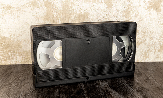 VHS cassette. The concept of film rental stores. A video cassette for a video recorder