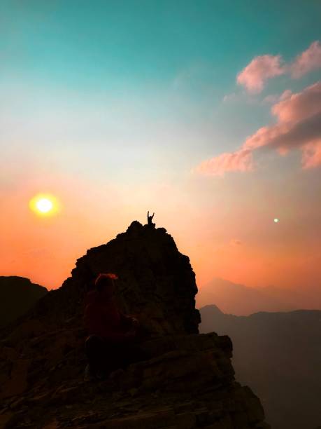 Mountain sunset person silhouette