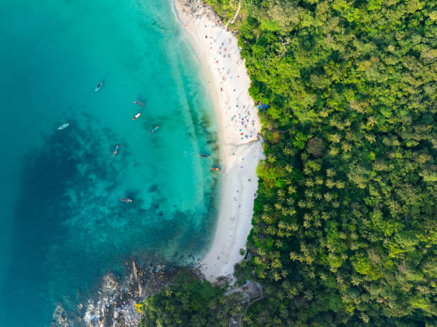 istock Amazing tropical seashore landscape background,Top view waves crashing on rocks 2069540428