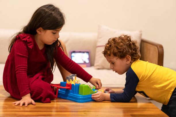 istock Playing with toys or watching digital tablet 2069559148