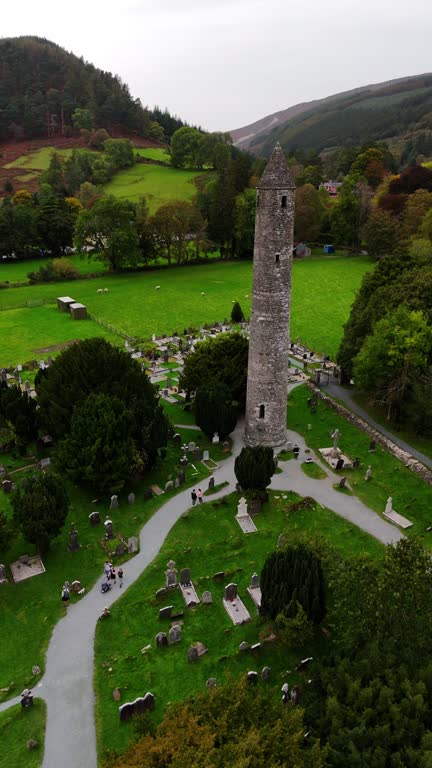 Aerial view of Glendalough ruins in Wicklow Ireland, Aerial view of Glendalough monastery, aerial view of Glendalough upper and lower lakes in Ireland, aerial view of ireland nature, popular tourist destination in Ireland