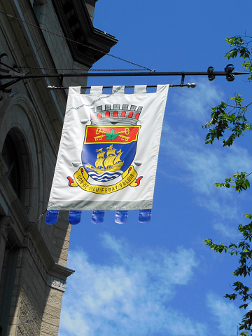 Flag with the Municipal coat of arms of Hallstatt on Lake Hallstatt, Austria, Europe