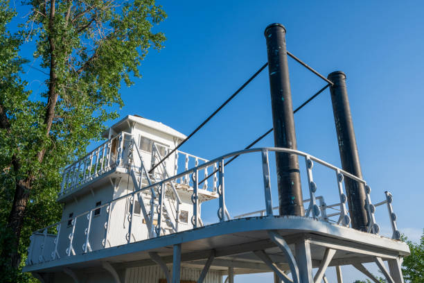 Bismarck, USA - June 10, 2023. Historic boat at Steamboat Warehouse State Historic Site on Missouri River, Bismarck, North Dakota, USA