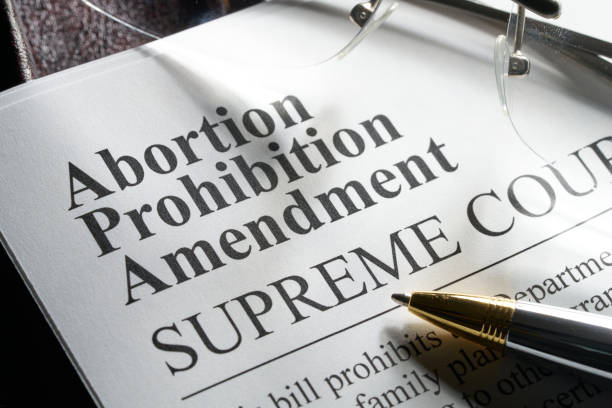 istock Abortion prohibition amendment document on binder with gavel and glasses 2069850107