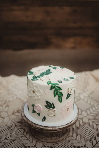 istock Flower and leaf birthday cake on a cake stand with copy space 2069873743