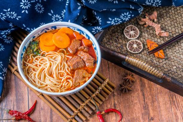 istock Chinese Food Braised Beef noodle soup in a tray 2069877343