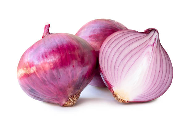 istock Front view of red or purple onion bulb with half in stack isolated on white background with clipping path 2069944530