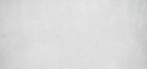 istock Wall Cement Background White Paint Stucco Plaster Floor Grey Paper Stone Interior Pattern Empty  Grunge Wallpaper Crack Surface Material Rough Abstract Grungy Dark Slate Block Backdrop Street Old. 2069987632