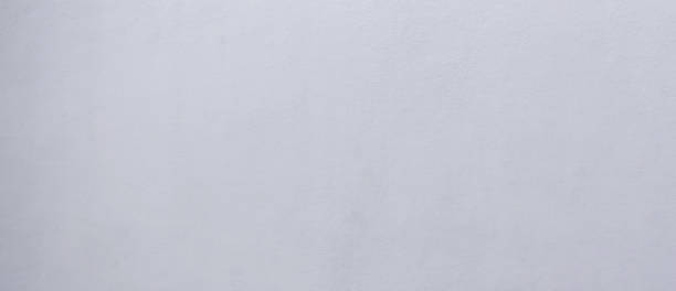 istock Wall Cement Background White Paint Stucco Plaster Floor Grey Paper Stone Interior Pattern Empty  Grunge Wallpaper Crack Surface Material Rough Abstract Grungy Dark Slate Block Backdrop Street Old. 2069987634