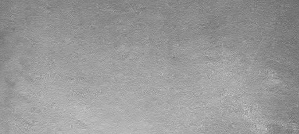 istock Wall Cement Background White Paint Stucco Plaster Floor Grey Paper Stone Interior Pattern Empty  Grunge Wallpaper Crack Surface Material Rough Abstract Grungy Dark Slate Block Backdrop Street Old. 2069987647