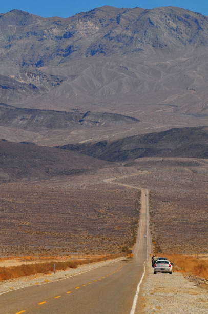 A road cutting through the harsh landscape of the Panamint Valley, Death Valley National Park, California, USA.