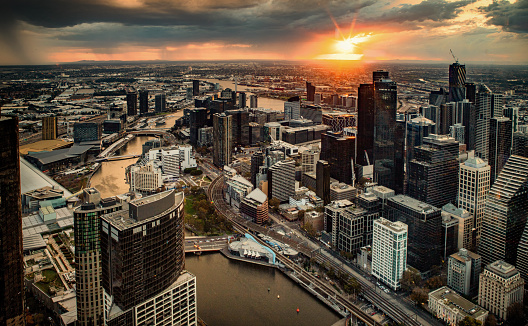 The aerial view of the urban skyline of Melbourne CBD in the sunset