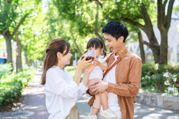 istock parent and daughter ,drink tea, 2070165570