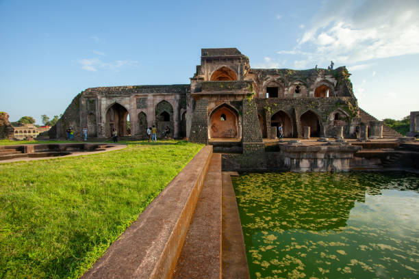 istock Ancient Jahaz Mahal at Mandu, India reflected in tranquil water 2070224776