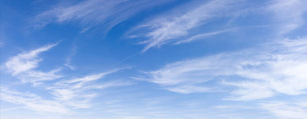 Fancy clouds in the sky stock photo