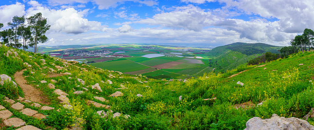 Panoramic winter view of the Jezreel valley countryside landscape, from the Gilboa mountain ridge. Northern Israel