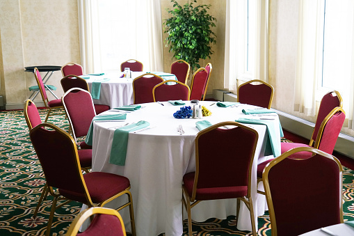 dinner tables and chairs in the banquet hall