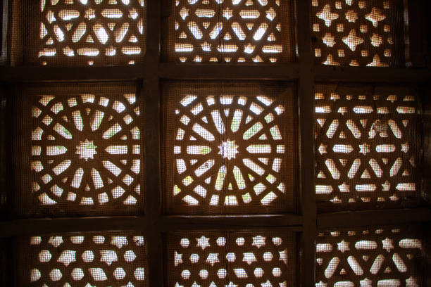 istock Intricate wooden lattice window design, Mandu, India 2070242689