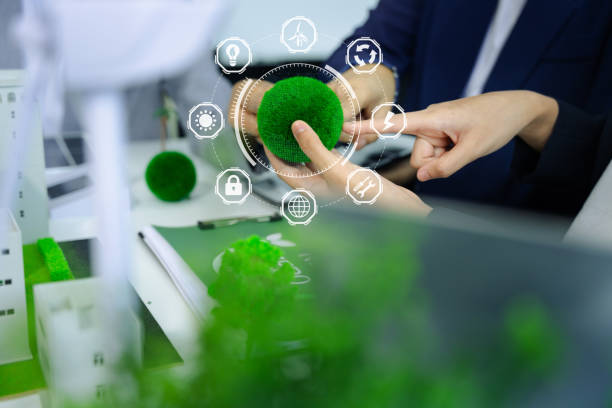 istock Business tam using tablet for working technology and business,  Renewable energy-based green businesses and global warming. Reduce CO2 emission. 2070262455