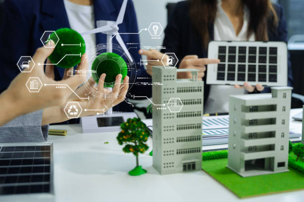 istock Business tam using tablet for working technology and business,  Renewable energy-based green businesses and global warming. Reduce CO2 emission. 2070262470