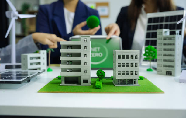 istock Business tam using tablet for working technology and business,  Renewable energy-based green businesses and global warming. Reduce CO2 emission. 2070262477