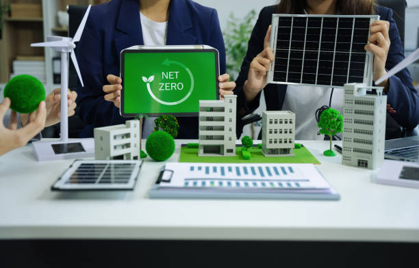Business tam using tablet for working technology and business,  Renewable energy-based green businesses and global warming. Reduce CO2 emission.