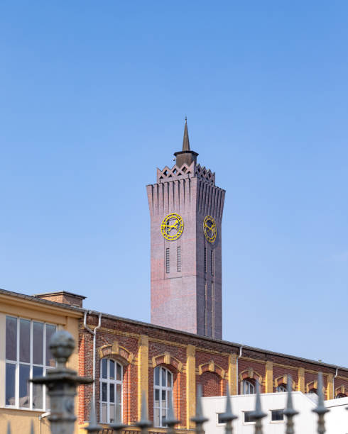 Wirkbau iconic clock tower in Chemnitz, Germany at midday with clear sky