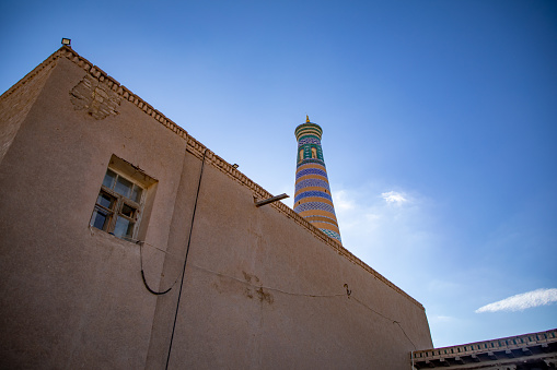 view of a tallest structure from the streets, Khiva, the Khoresm agricultural oasis, Citadel.