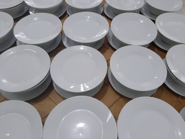 istock plates are neatly arranged on the buffet table to welcome guests 2070316274