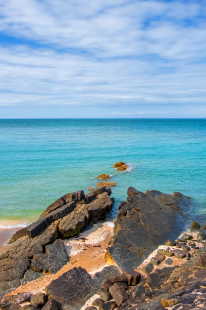 istock Rocky Beach, Sand And Turquoise Sea 2070317309