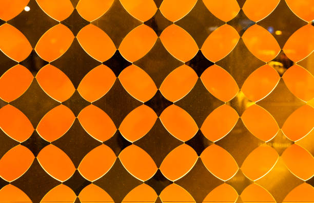 Yellow decorative translucent glass with a diamond pattern.