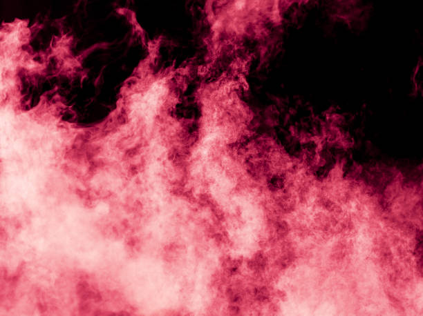 istock Red smoke isolated black background 2070320530