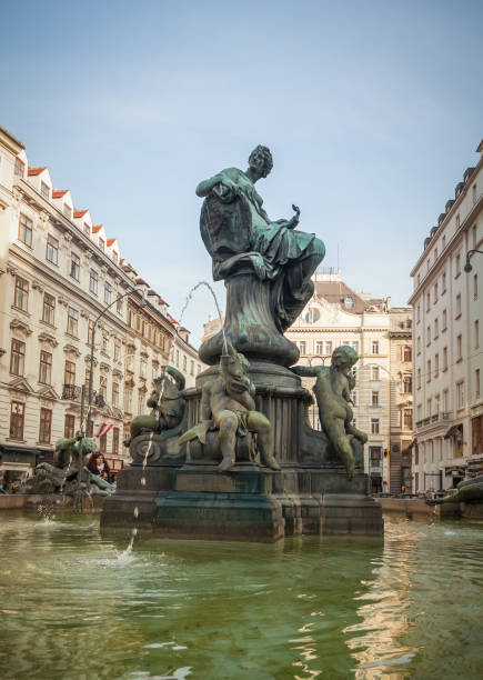 Vienna, Austria - October 14, 2013: Donnerbrunnen fountain in Vienna's old town -  close-up view. Providentia statue surrounded by four figures,