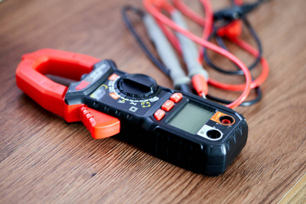 istock digital multimeter lies on the table 2070381863