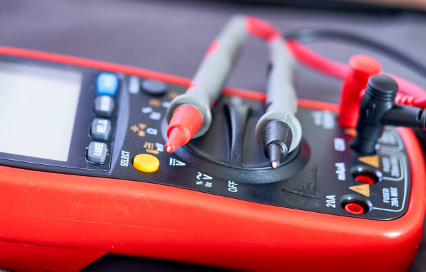 istock digital multimeter lies on the table 2070383415