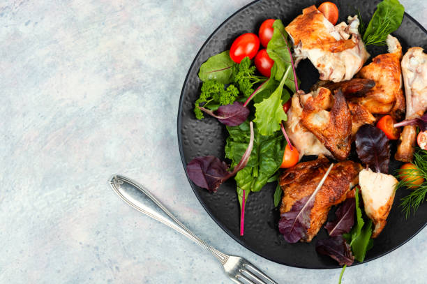 istock Appetizing slices of baked chicken. 2070386518