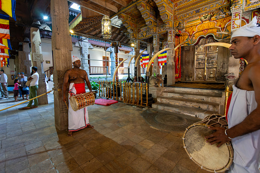 Kandy, Sri Lanka - January 24, 2024: Witness the solemn local rituals performed inside Sri Dalada Maligawa, the sacred Temple of the Sacred Tooth Relic, in Kandy, Sri Lanka.